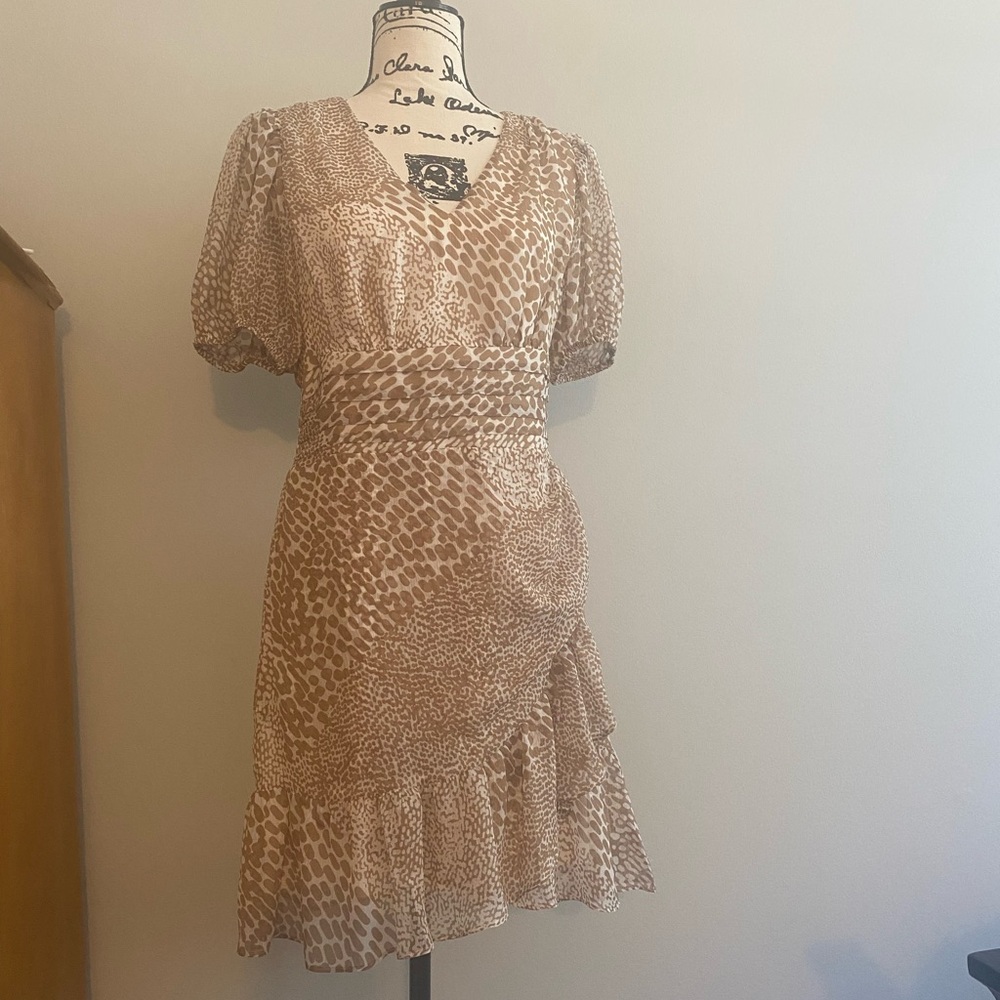 Pretty beige and cream dress.